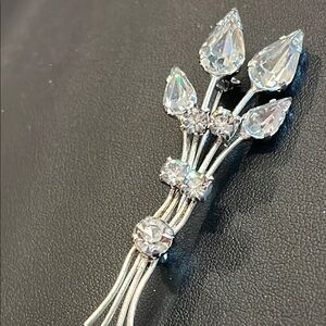 Pear Shaped sparkly rhinestones in Silvertone Brooch by Austria. Excellent